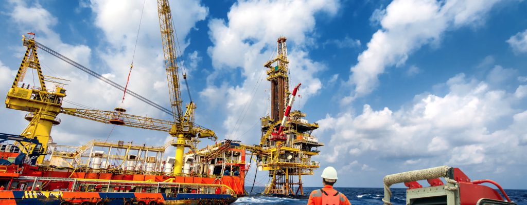echnician or worker on the crew boat during transfer to platform echnician or worker on the crew boat during transfer to platform or drilling rig in process oil and gas platform offshore,technician